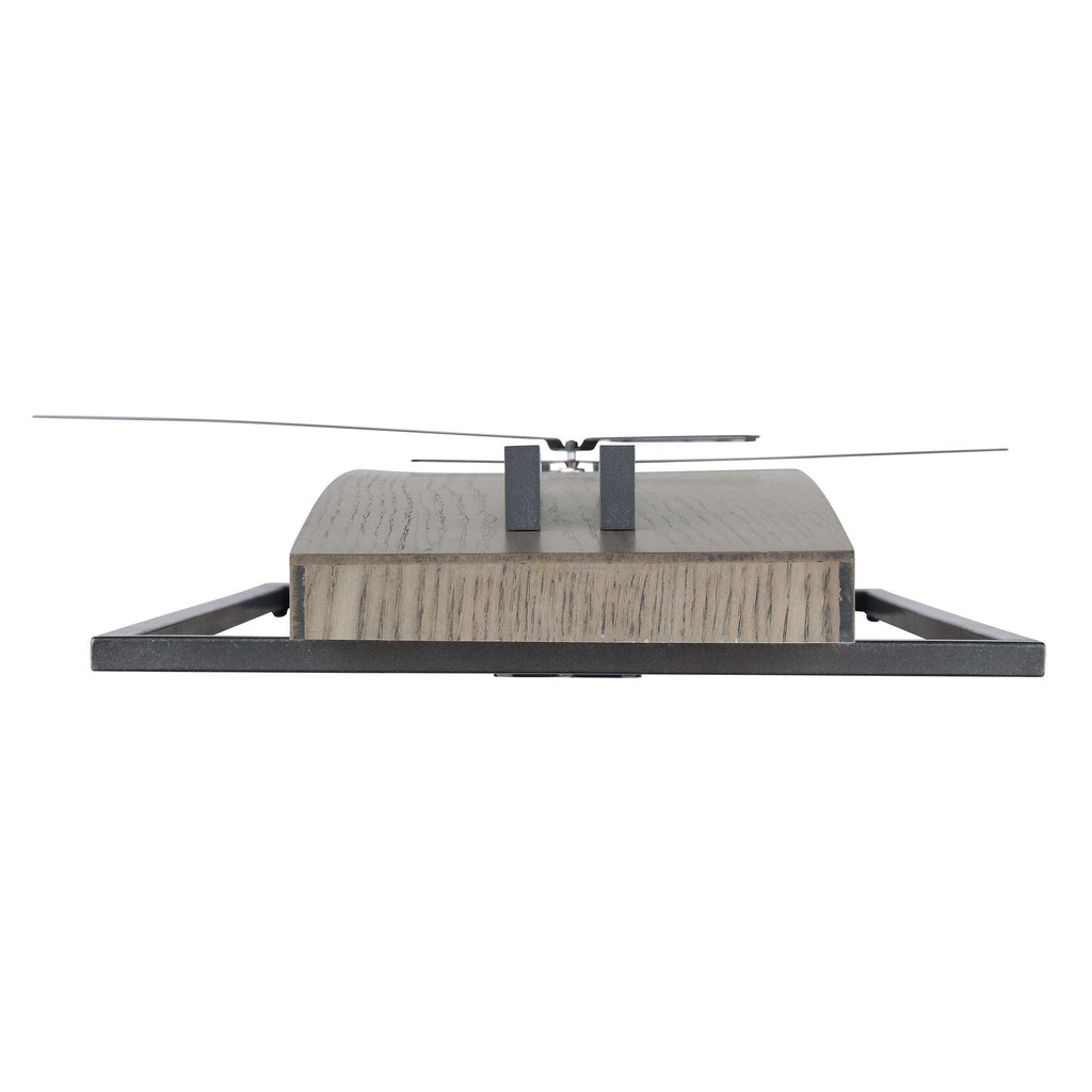 A modern decorative object with a wooden base and metal accents, viewed from the front.