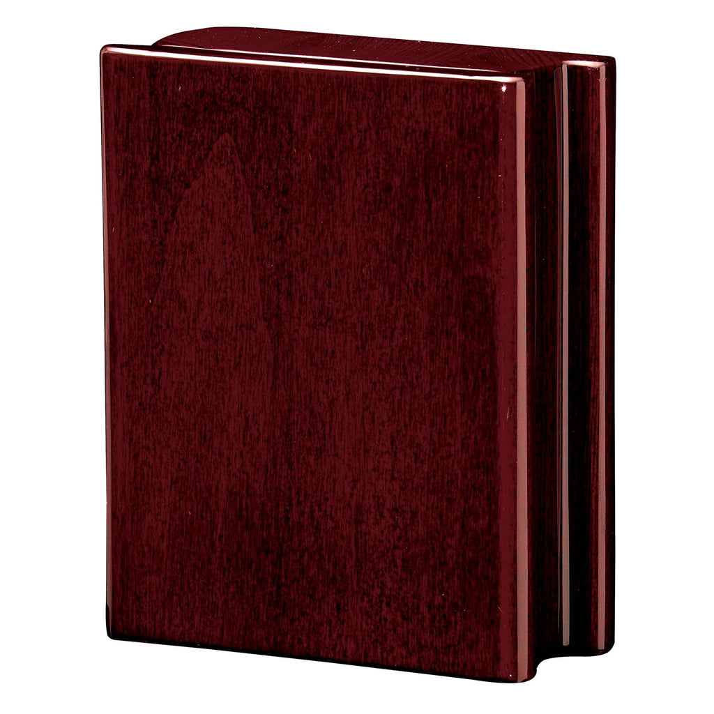 A dark wooden bookend.