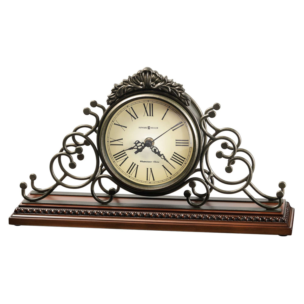 Antique-style decorative mantel clock with ornate design and Roman numerals.
