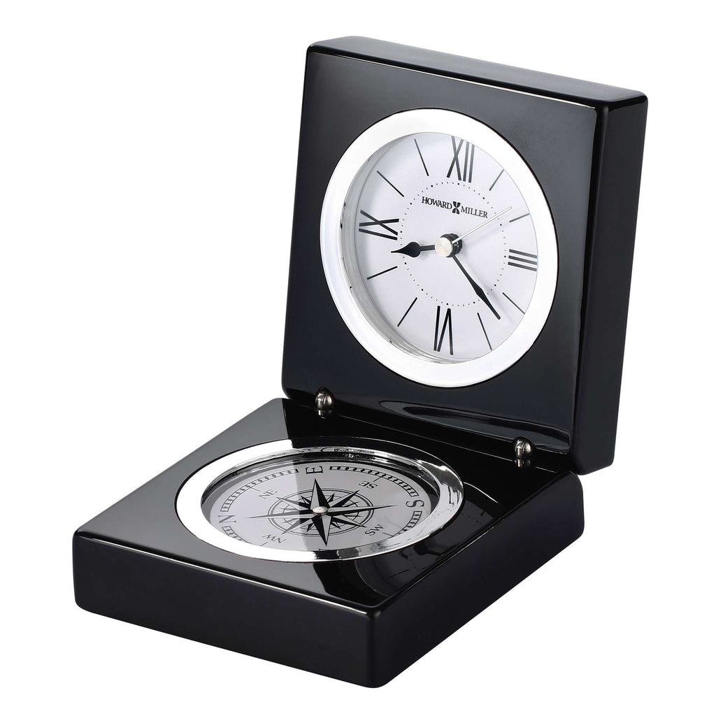 A stylish black clock and compass combination, featuring Roman numerals on the clock face.