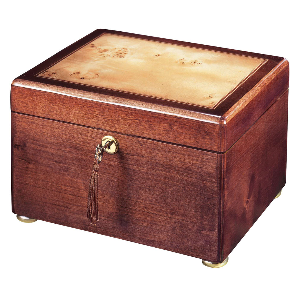 Elegant wooden box with a smooth top and gold accents.