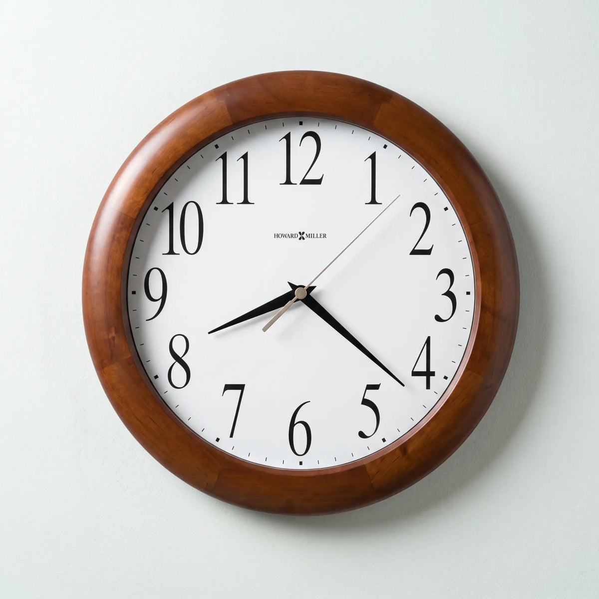 Howard Miller Corporate Wall Clock, 13-inch, front view on a plain white background
