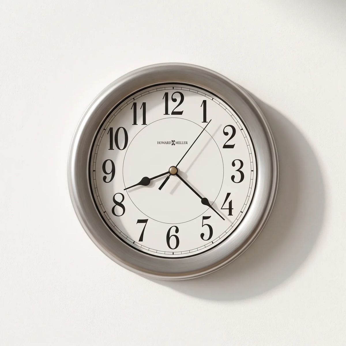 Howard Miller Aries Wall Clock, 8-inch, front view on a plain white background