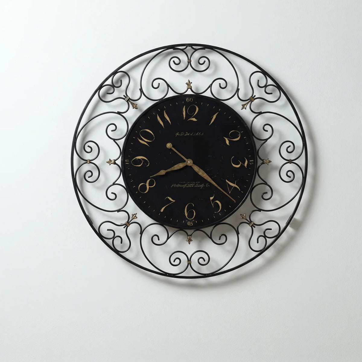Howard Miller Joline Wall Clock, 36-inch, front view on a plain white background