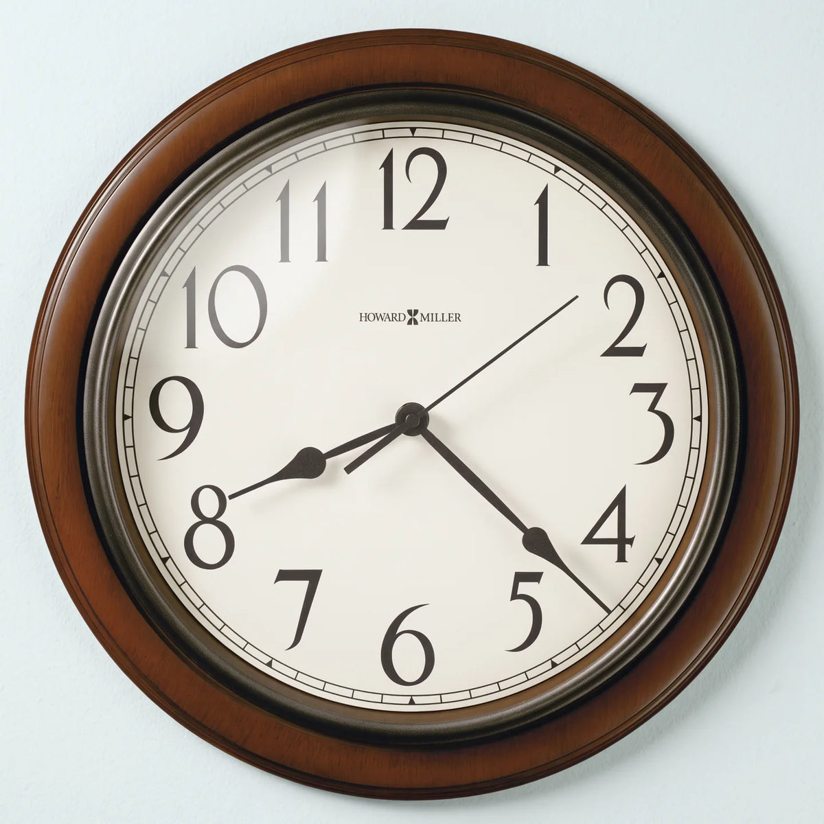 Howard Miller Kalvin Wall Clock, 15-inch, front view on a plain white background