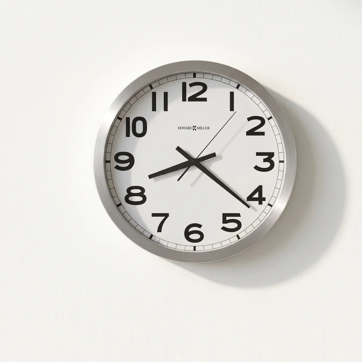 Howard Miller Spokane Wall Clock, 16-inch, front view on a plain white background