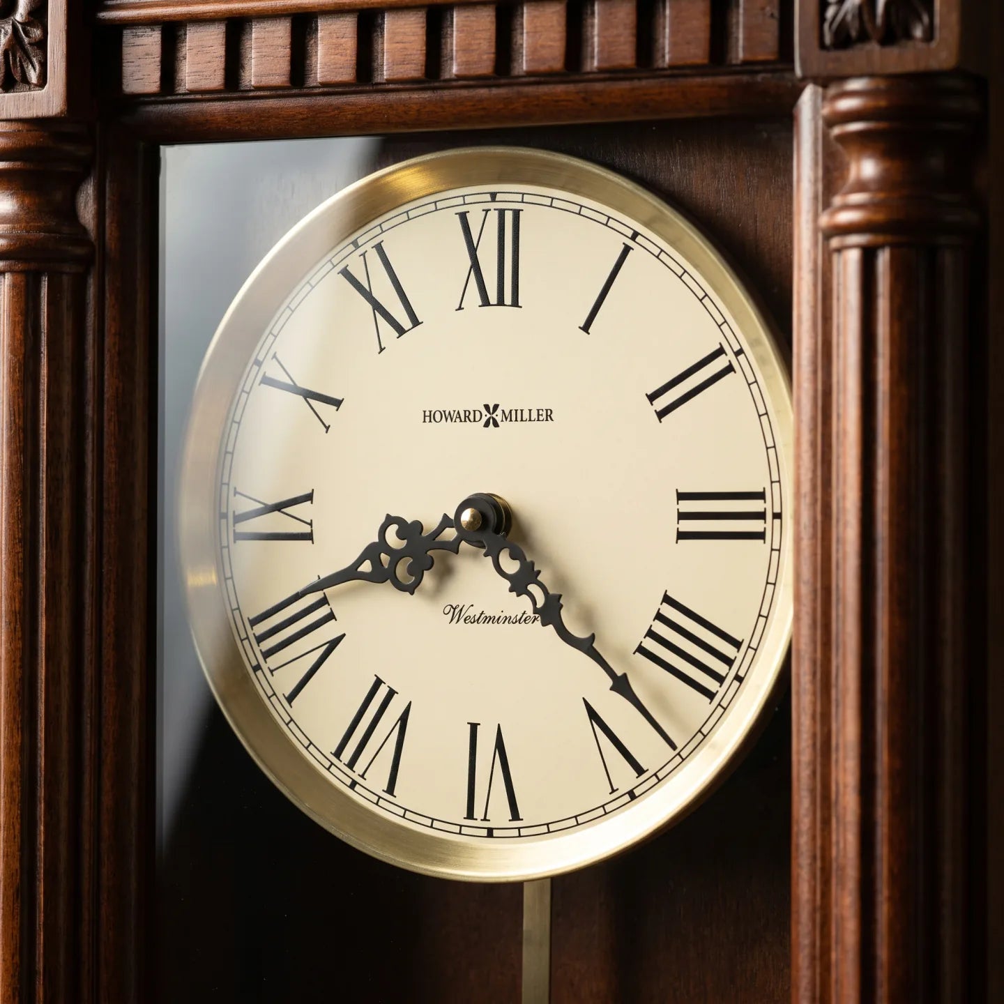 Howard Miller Lewisburg Wall Clock, close-up of the dial and finish detail