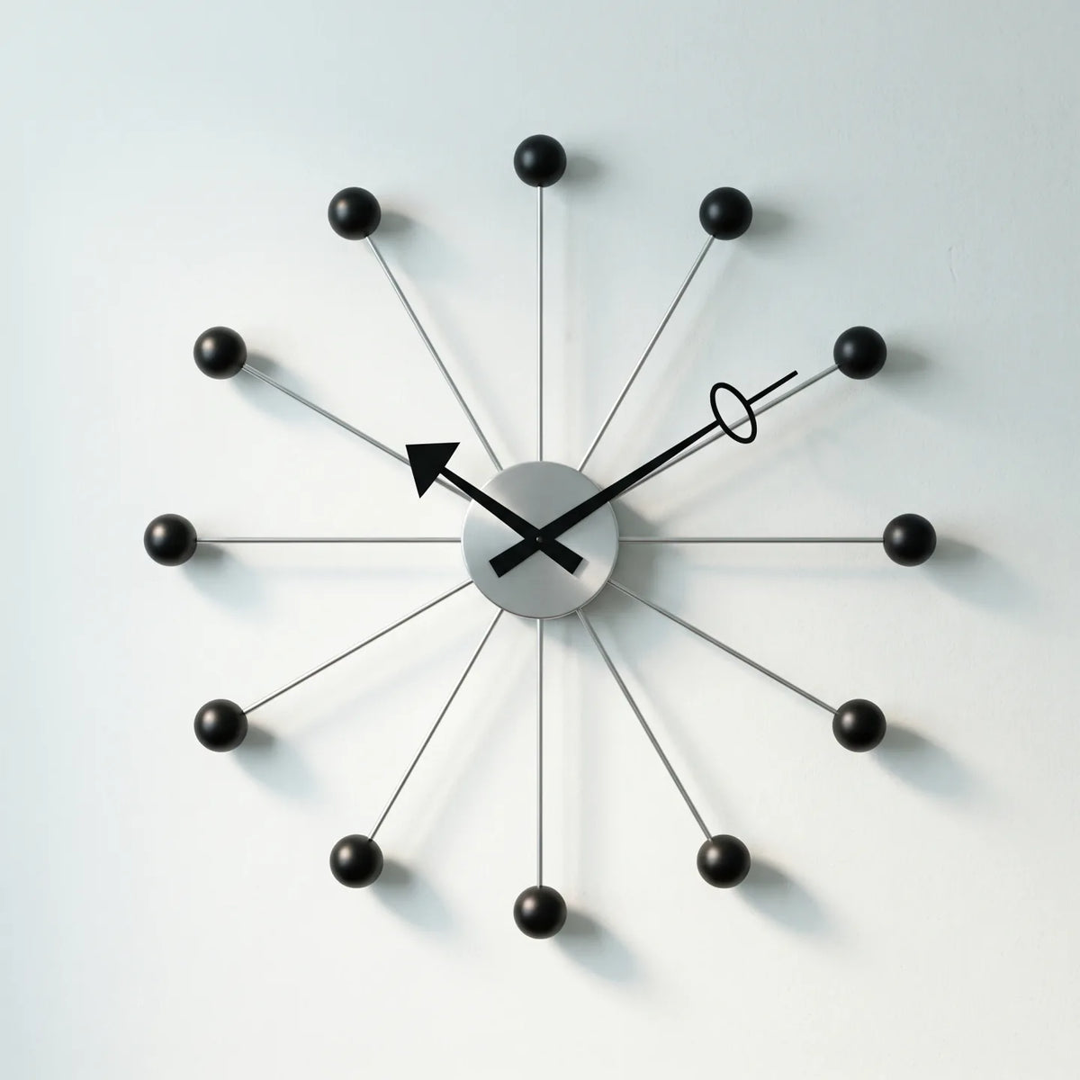 Howard Miller Ball Clock II Wall Clock, 42-inch, front view on a plain white background
