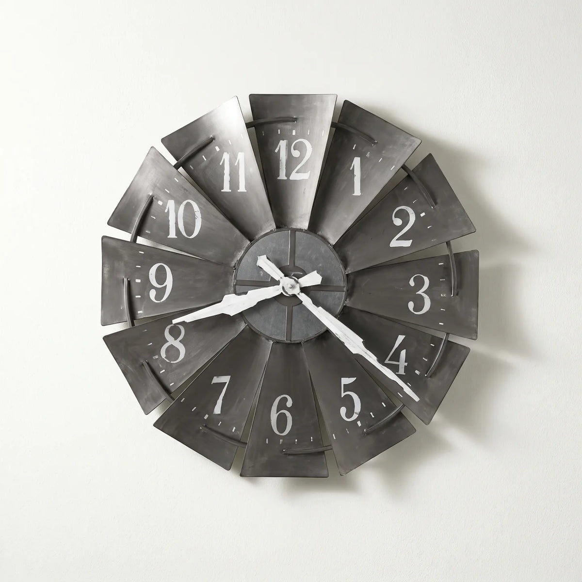 Howard Miller Windmill Wall Clock, 34-inch, front view on a plain white background