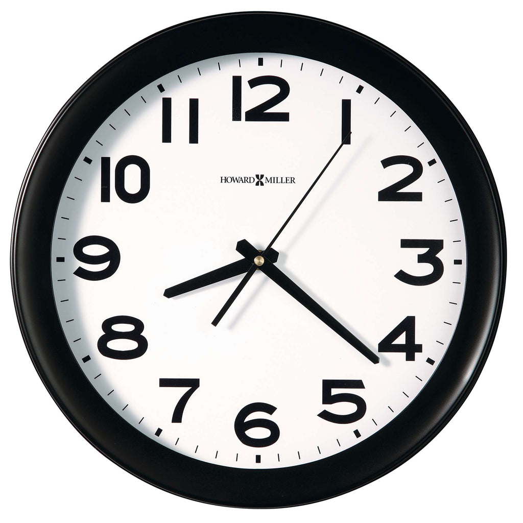 A round wall clock with black numbers on a white face and black frame, showing the time as approximately 10:10.