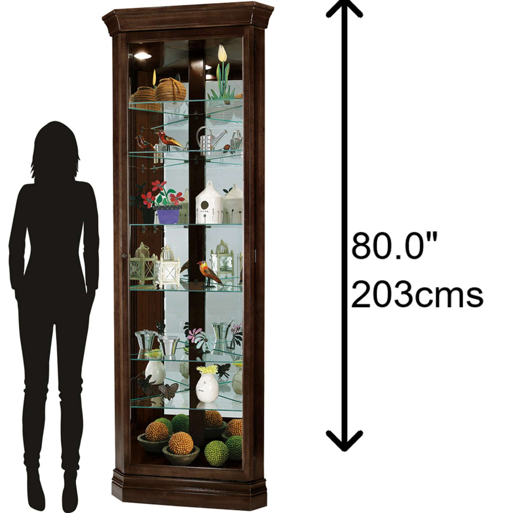 Tall display cabinet with glass shelves, featuring decorative items and a silhouette of a person for size reference.