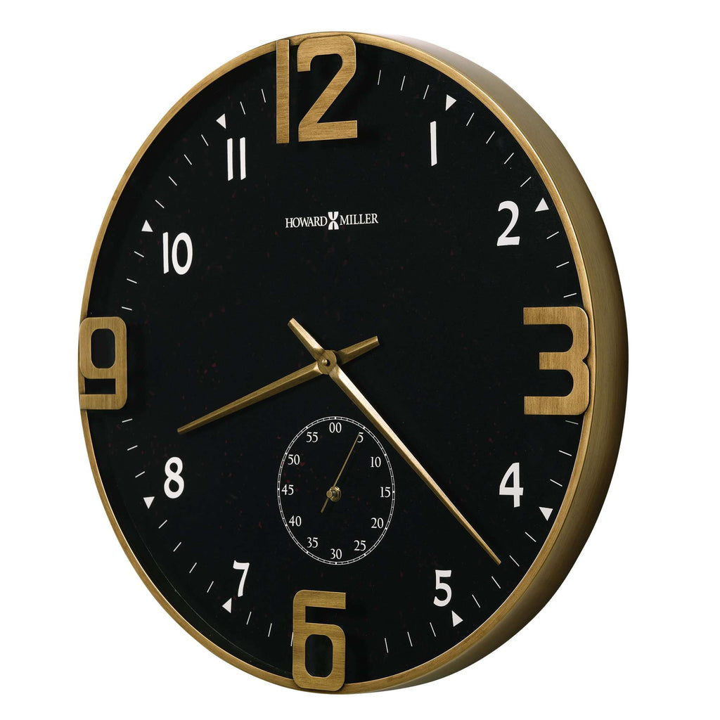 Black wall clock with gold accents and a small dial