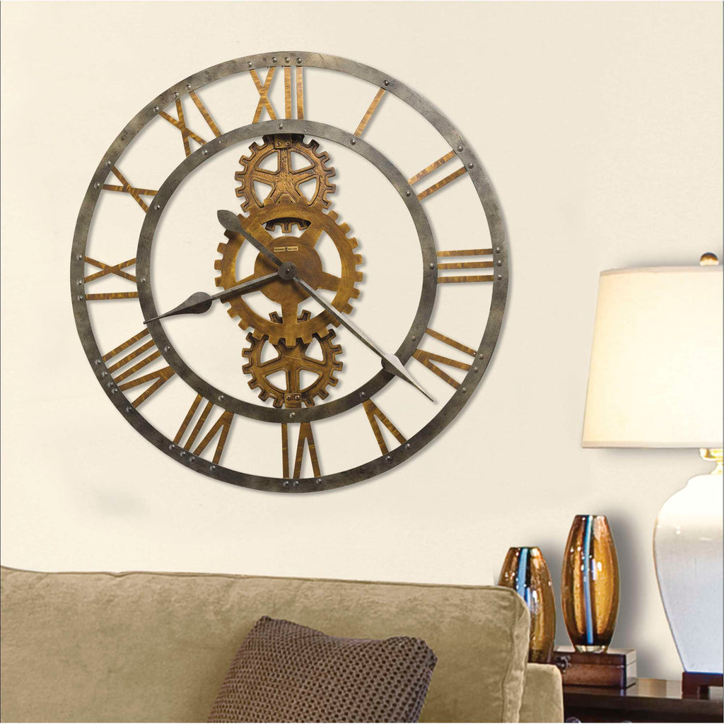A stylish wall clock featuring a gear design and large Roman numerals, displayed in a cozy living room setting.