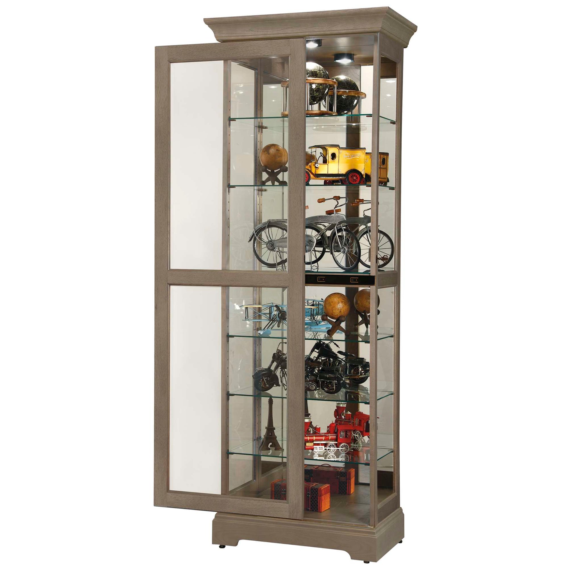 A tall, glass display cabinet showcasing various collectibles and models.
