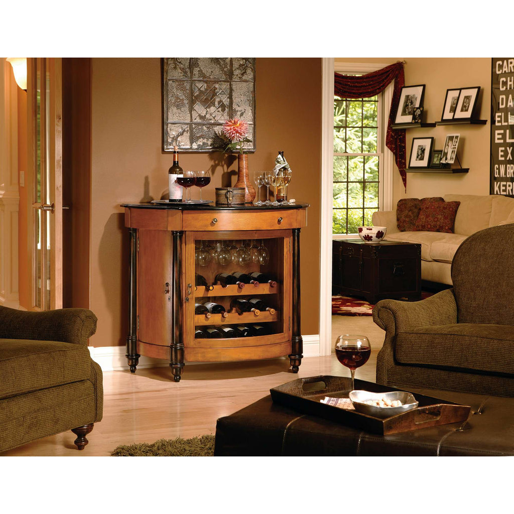 A stylish wooden bar cabinet with wine storage, surrounded by a cozy living room setting.