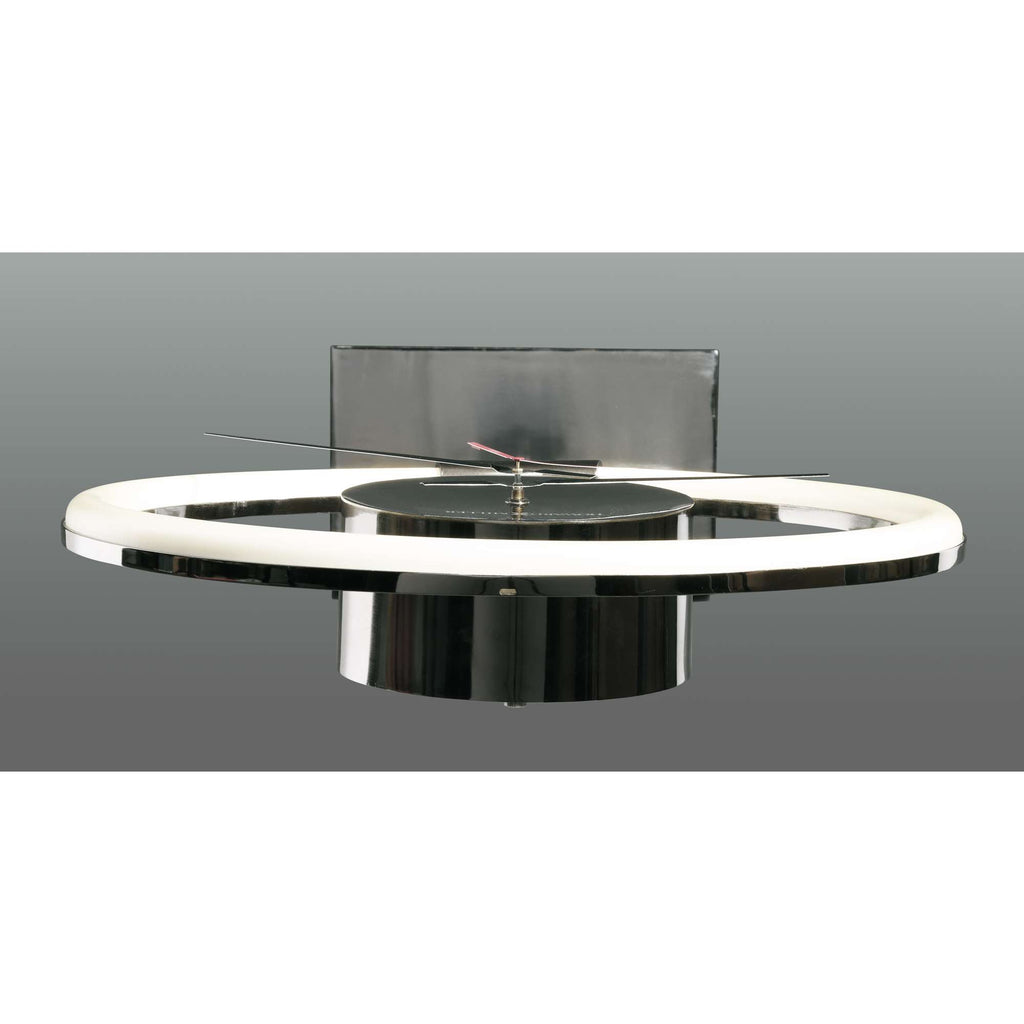 Modern round table with a sleek black base and illuminated circular edge.