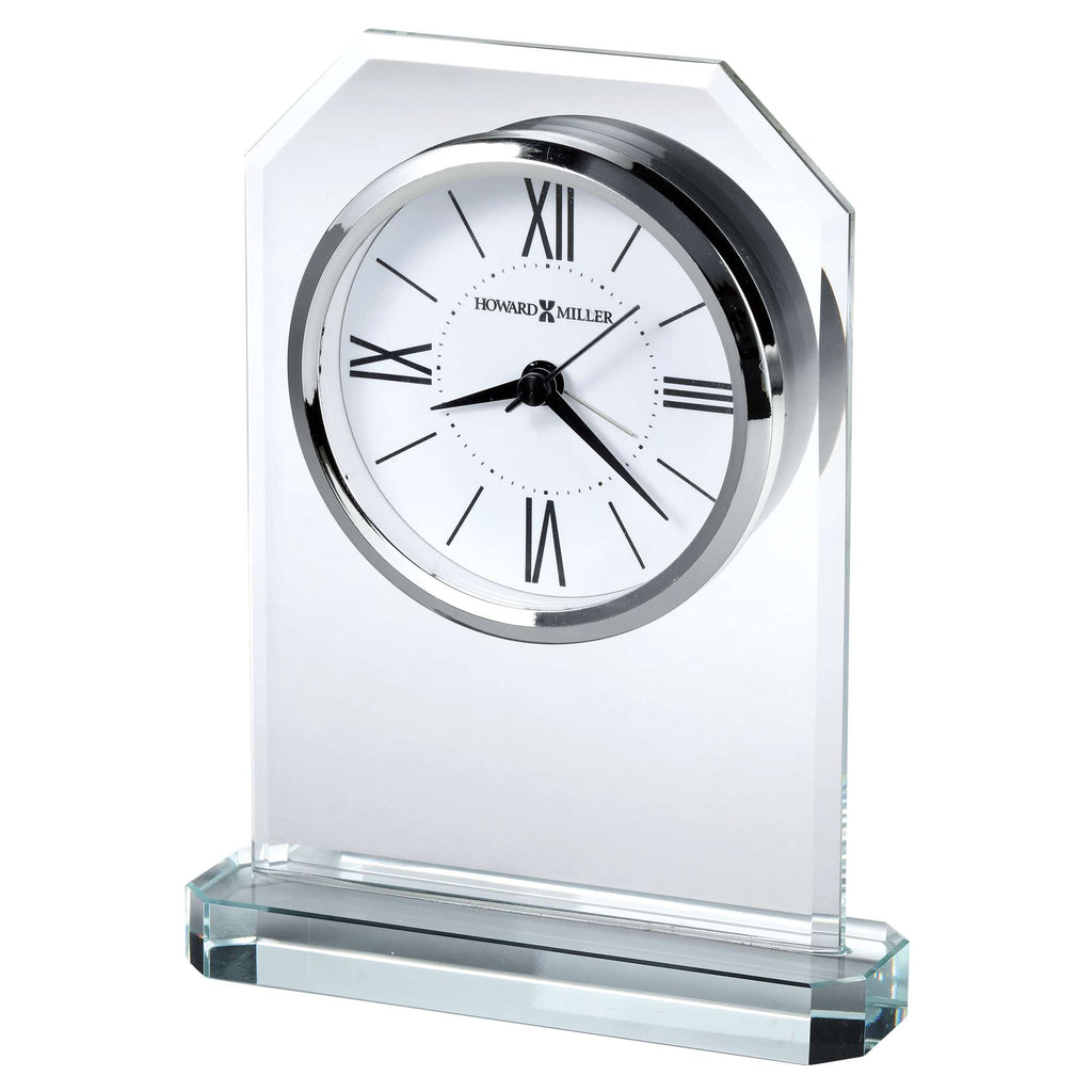 A clear glass desk clock with Roman numerals and a sleek design.