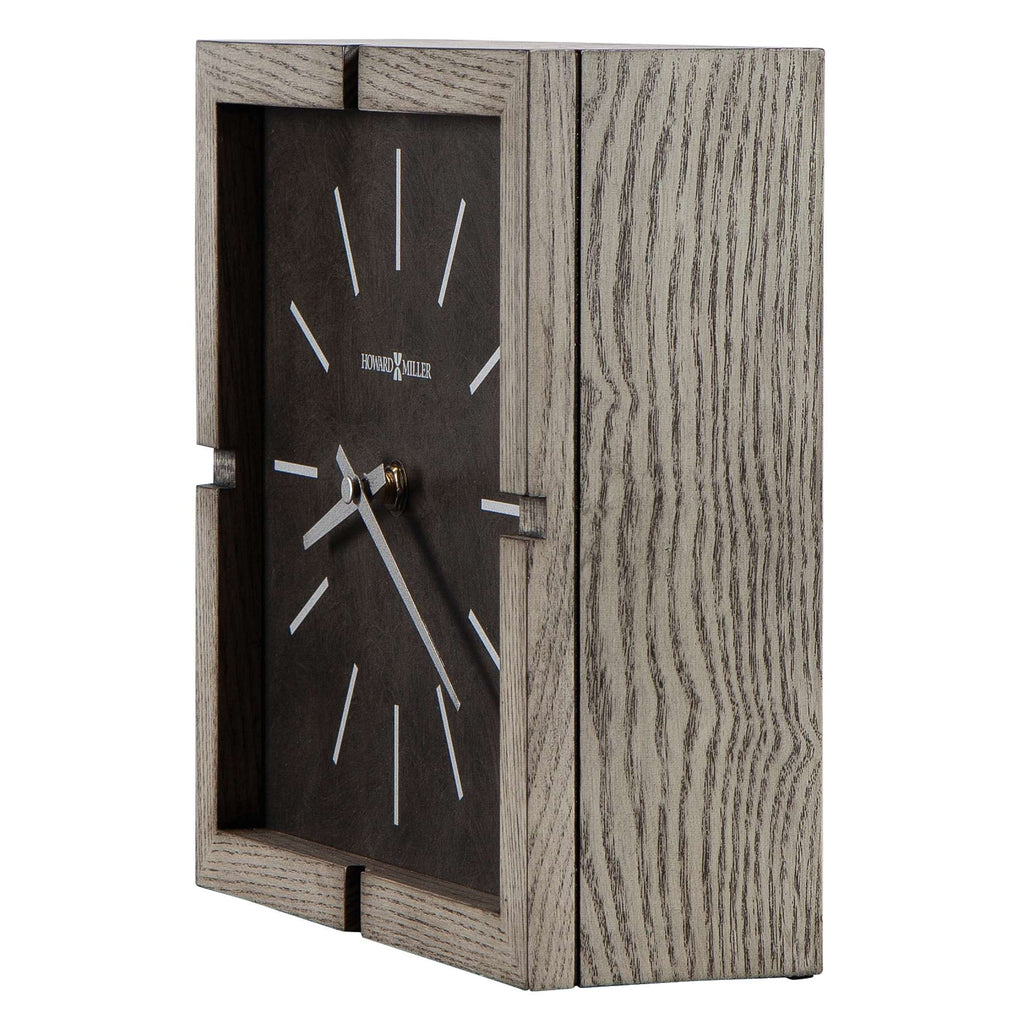 Stylish wooden clock with a minimalistic design and dark face.