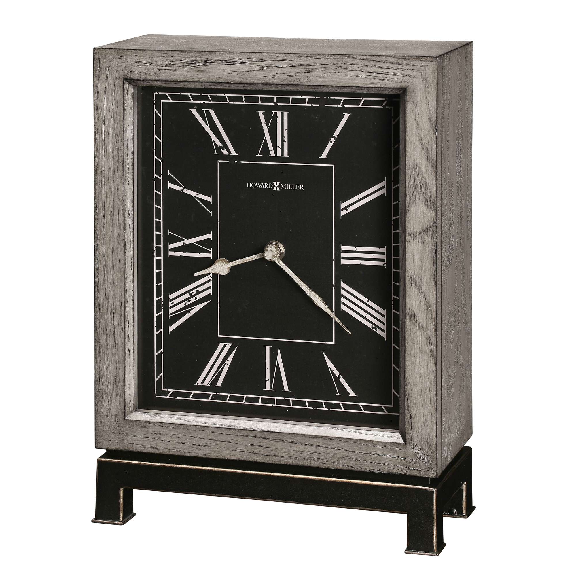 A stylish tabletop clock with a black face and Roman numerals in a wooden frame.