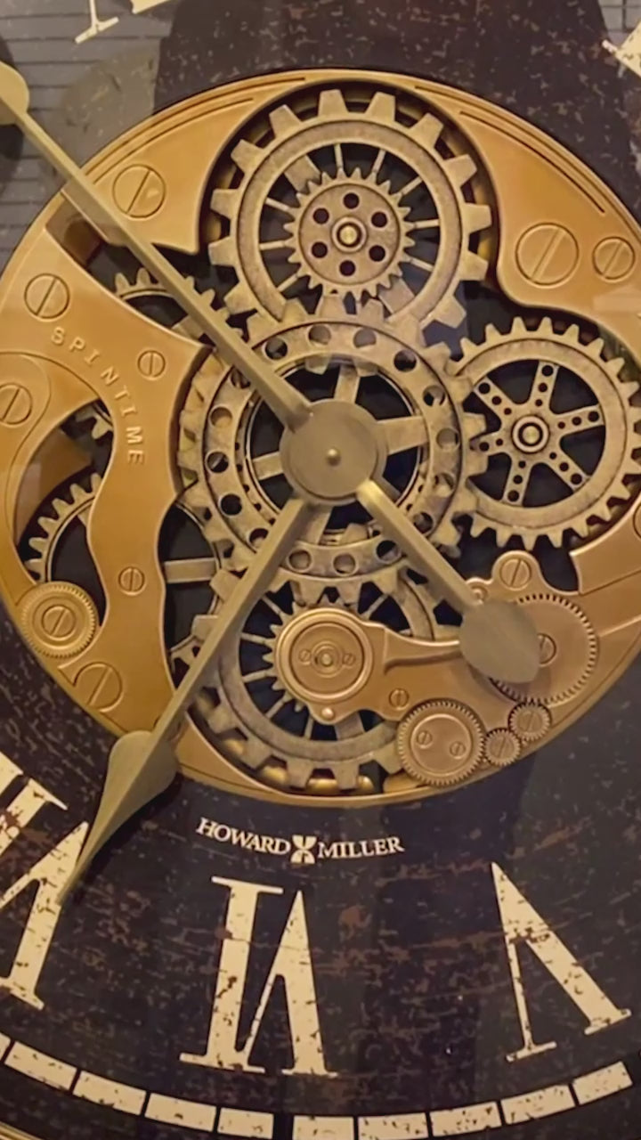 Close-up of an intricate clock mechanism featuring gears and brass detailing.