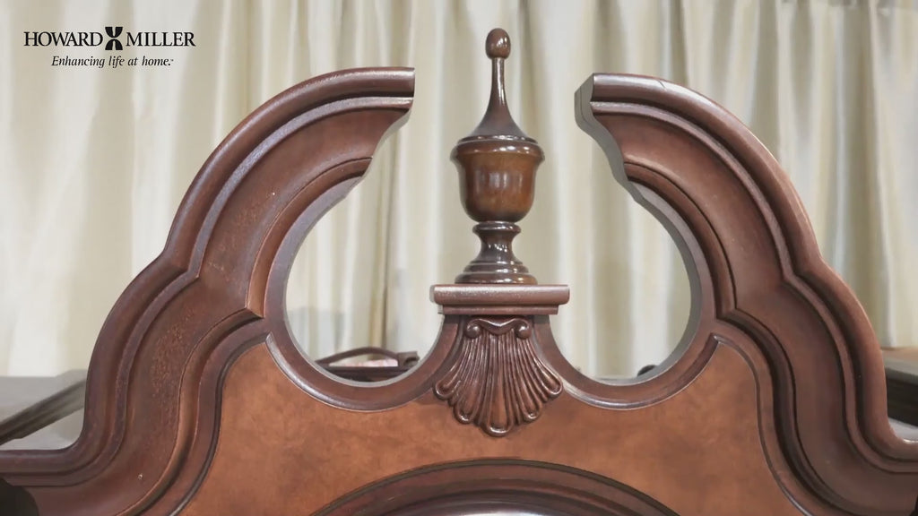 Close-up of a decorative wooden headboard with intricate design elements.