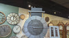 Display of various wall clocks in a store