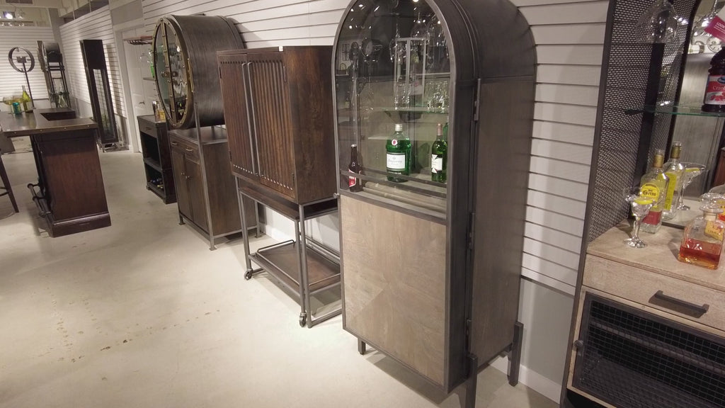 Interior display of modern bar cabinets in a retail setting.