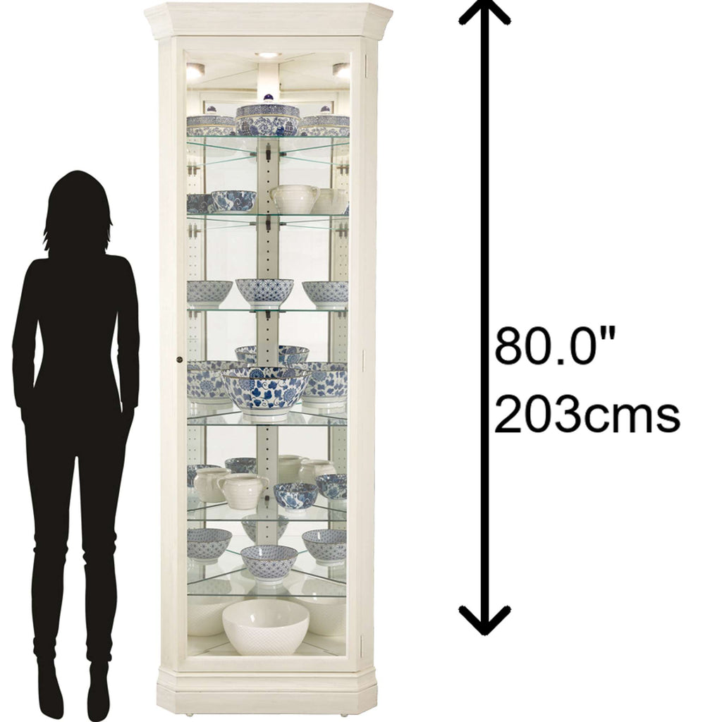 Tall display cabinet with glass shelves showcasing decorative bowls, alongside a silhouette for scale.