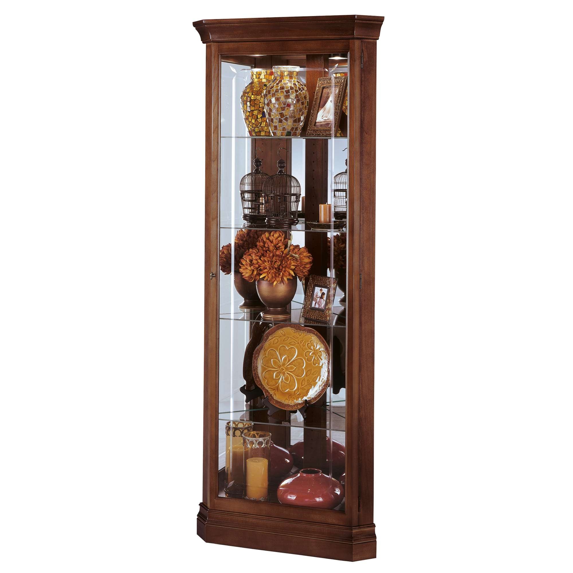 Wooden display cabinet with glass shelves showcasing decorative items and vases.