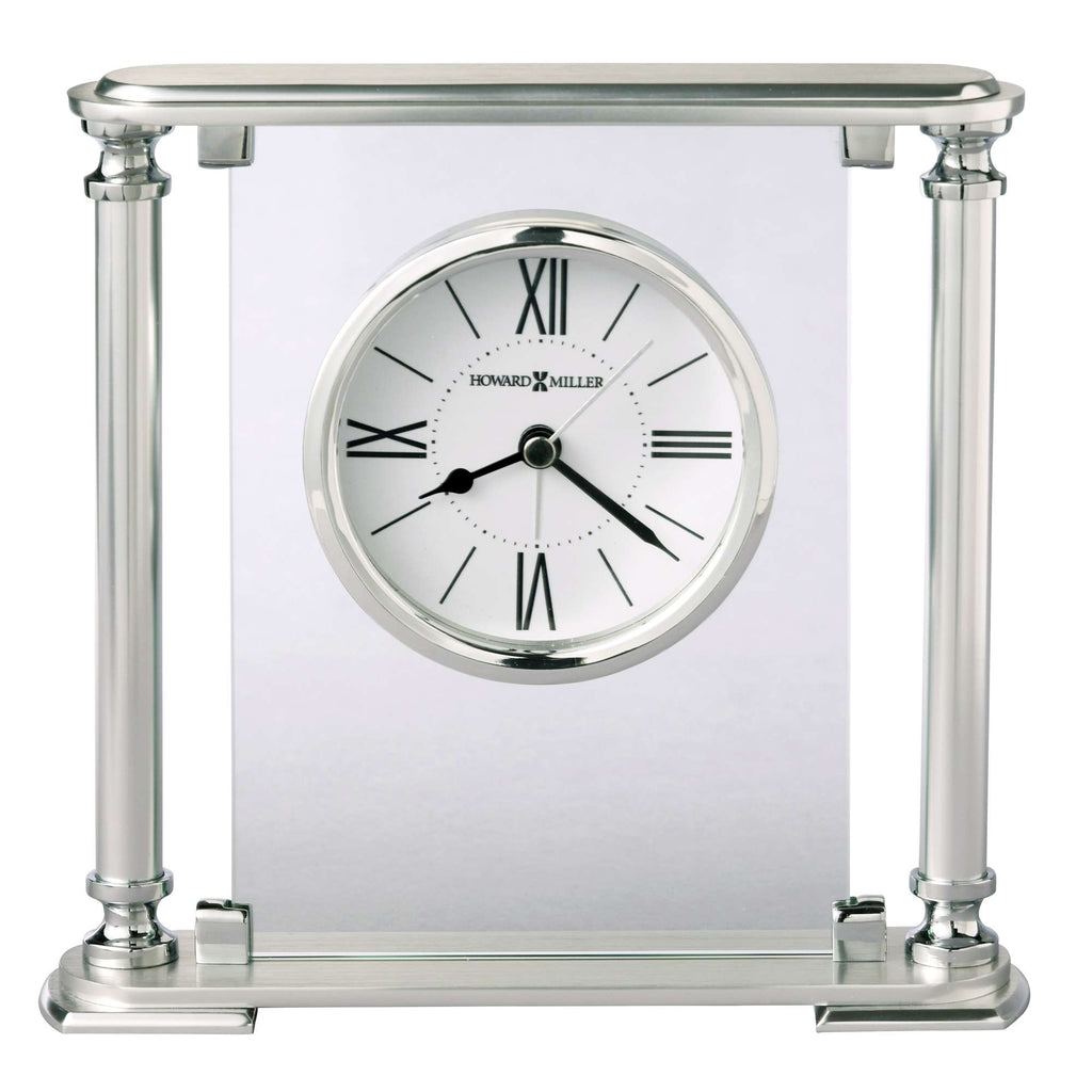 A stylish silver desk clock with Roman numerals and a clear backdrop.