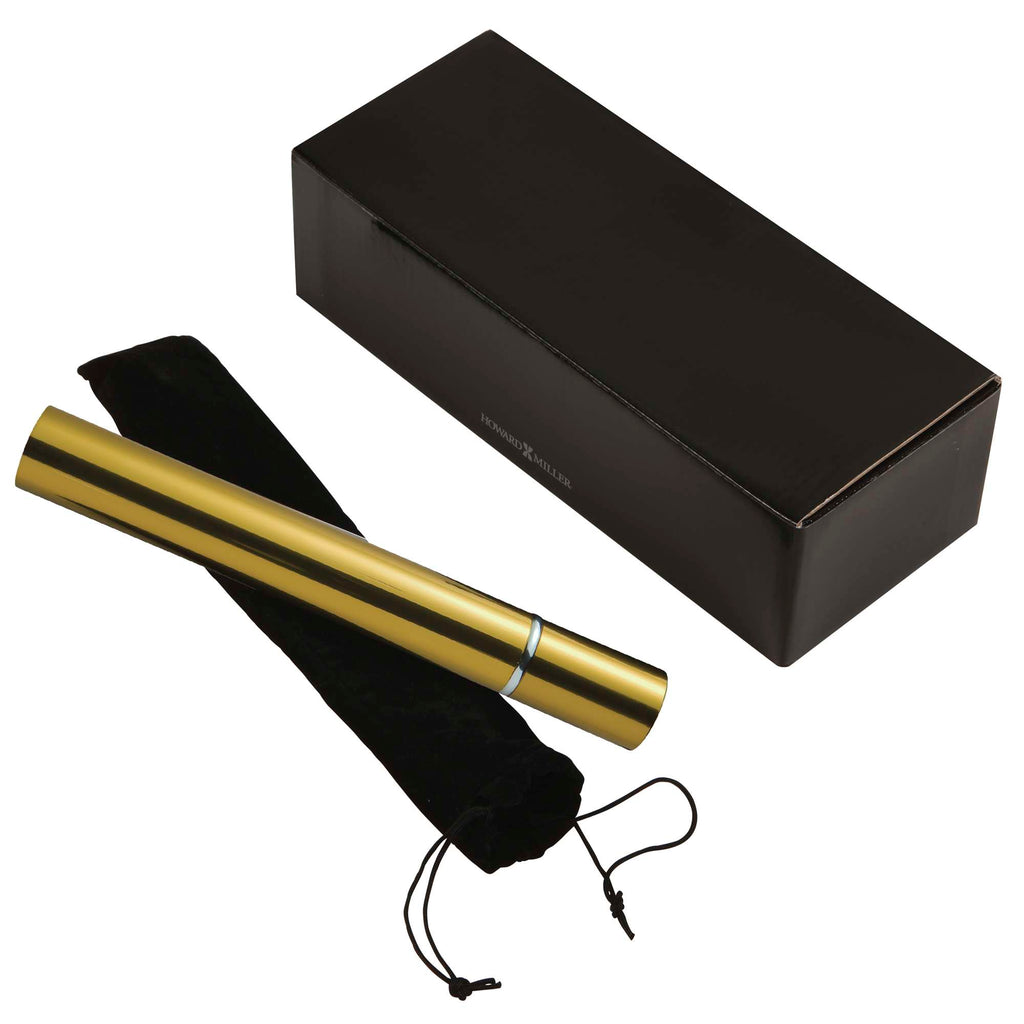 A gold tube placed next to a black box and a black pouch.