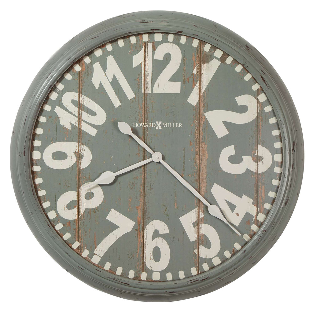 Round wall clock with large white numbers on a distressed blue background.