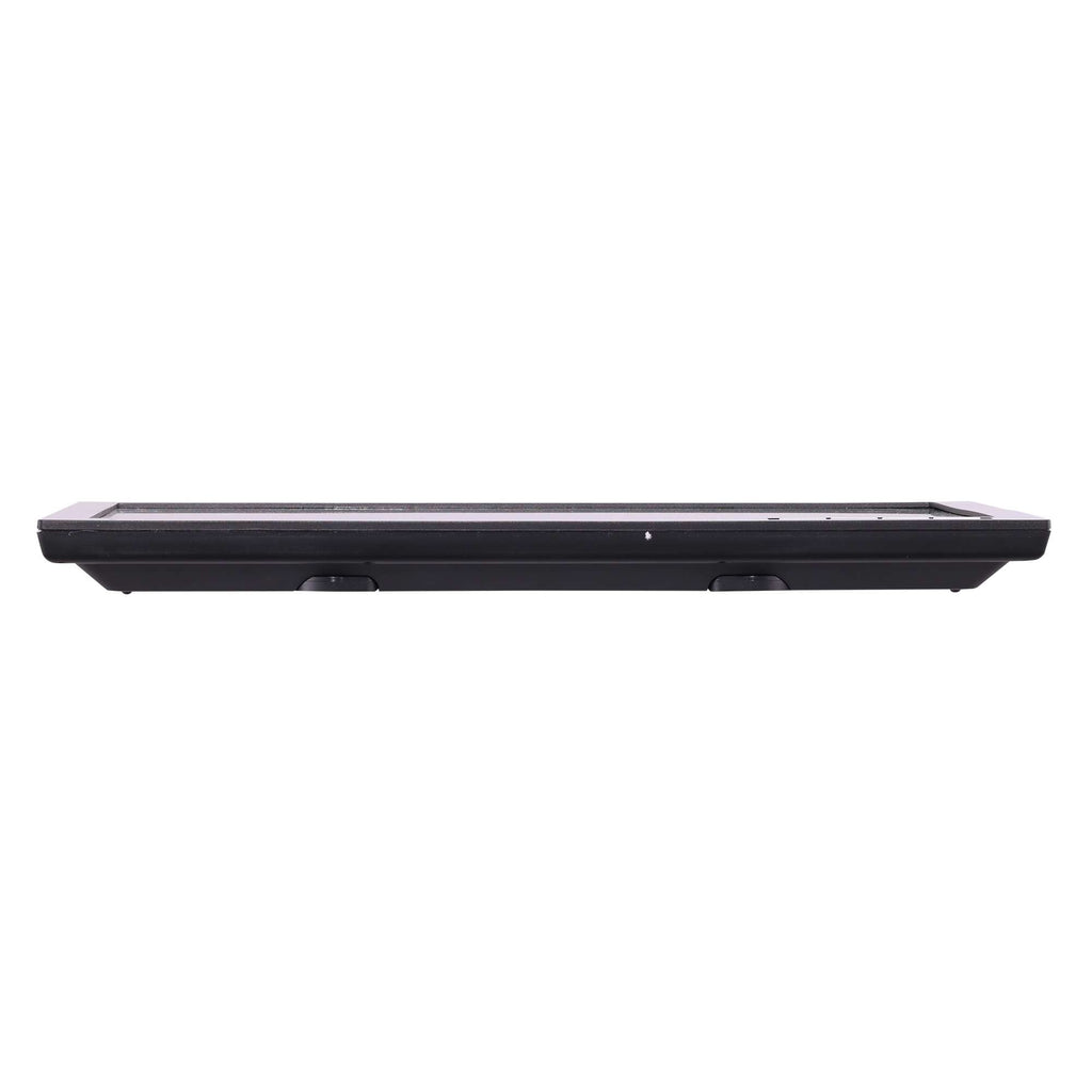 A sleek black flat device with a smooth surface, viewed from the side.