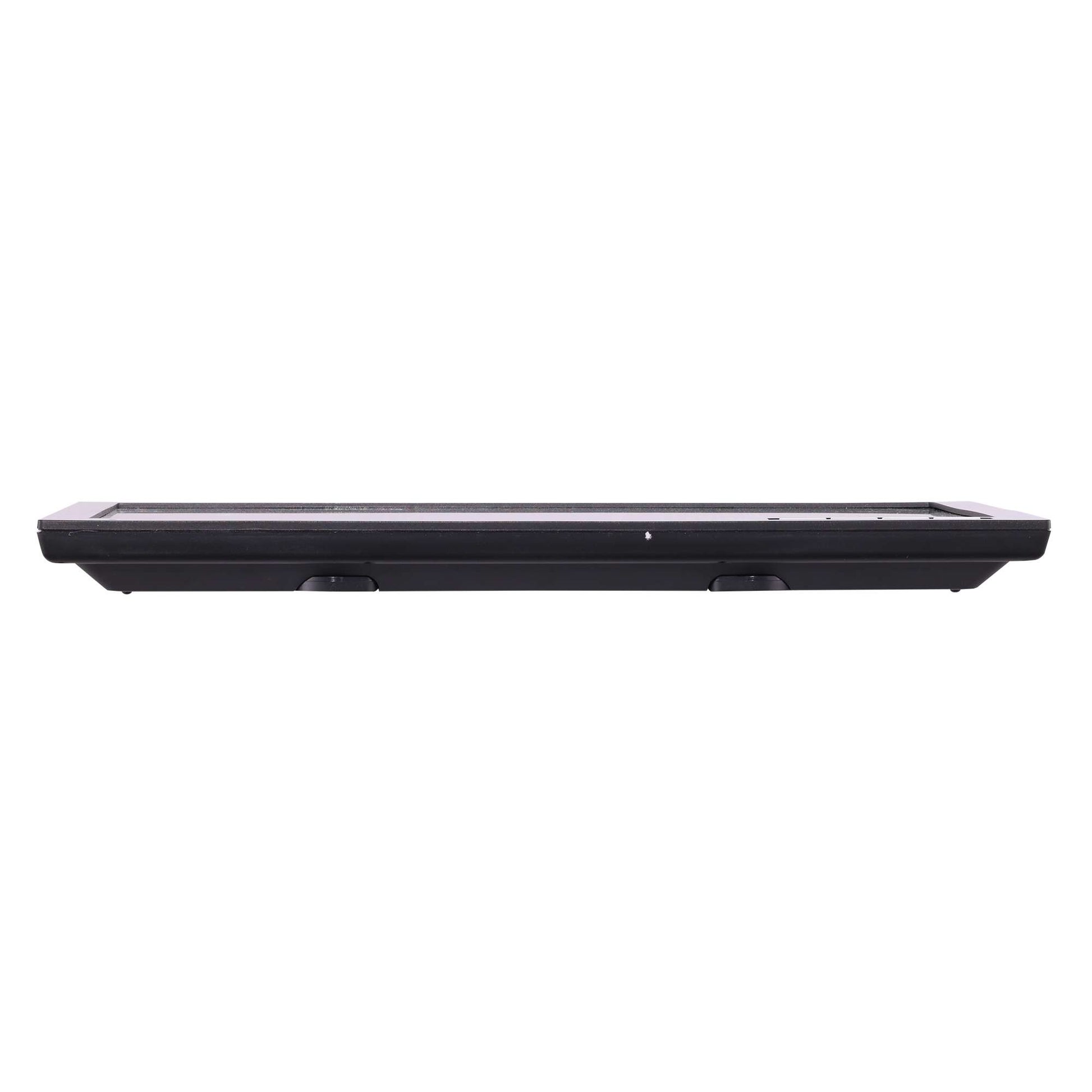 A sleek black flat device with a smooth surface, viewed from the side.