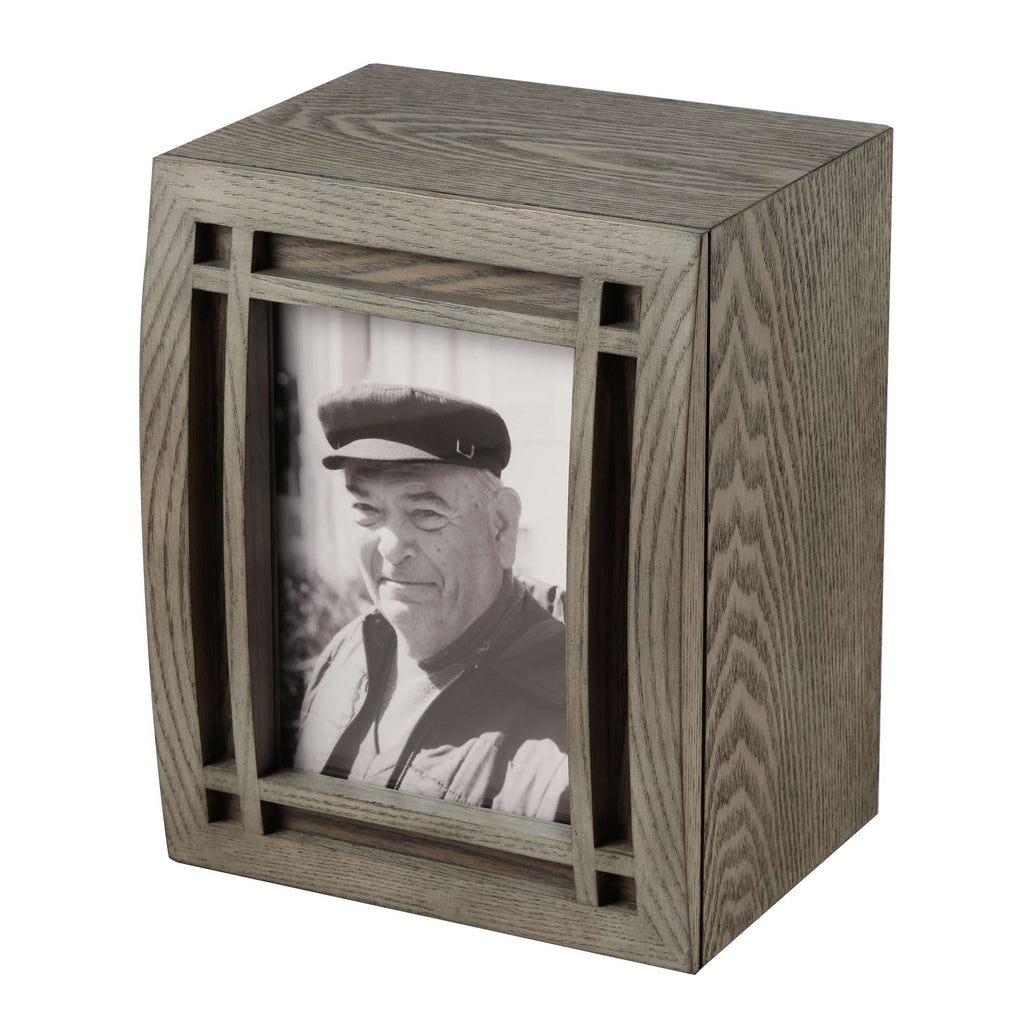 Decorative wooden photo frame with a black and white portrait inside
