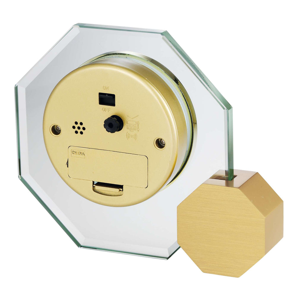 Octagonal wall clock with a golden back and geometric design