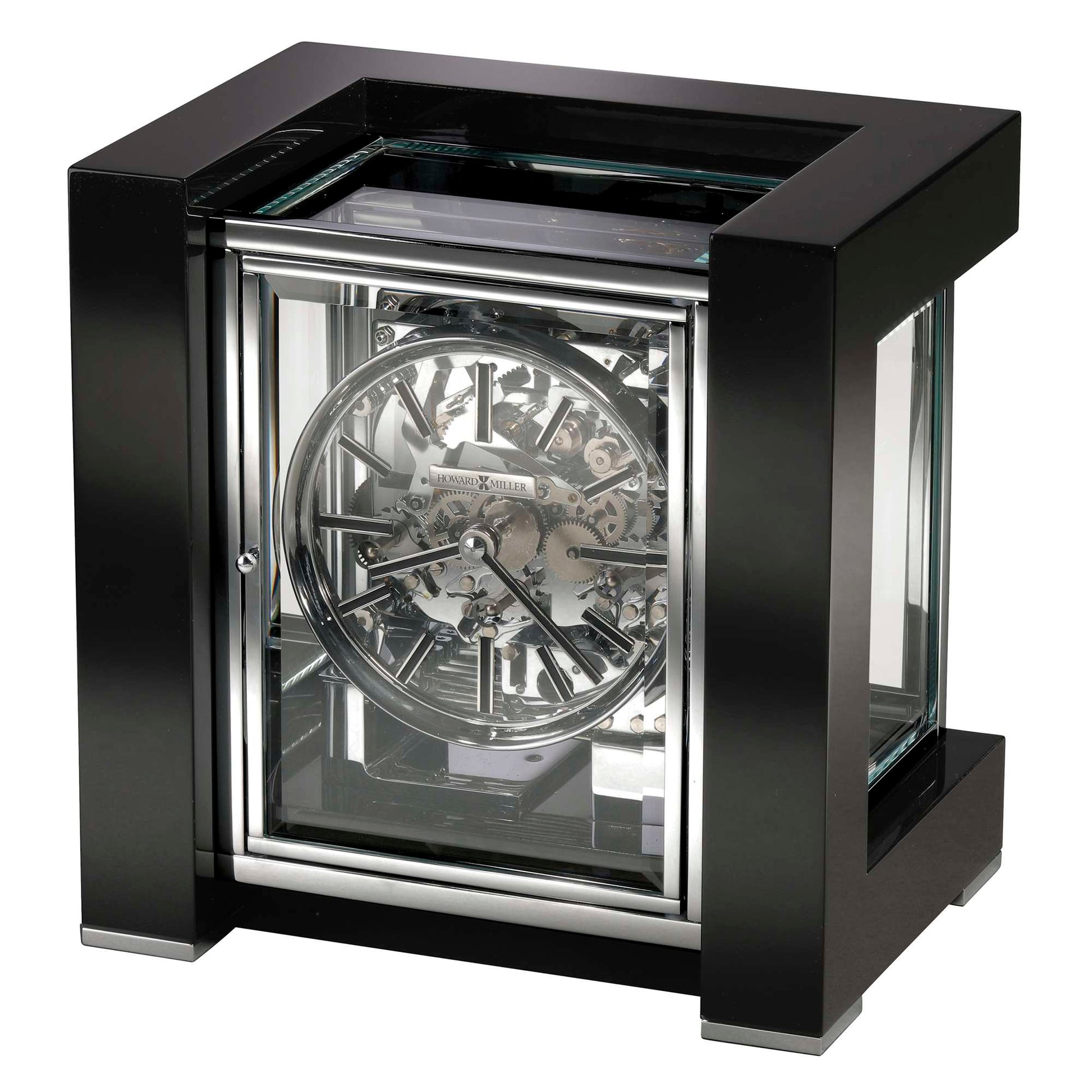 A modern mechanical clock encased in a glass and black frame.