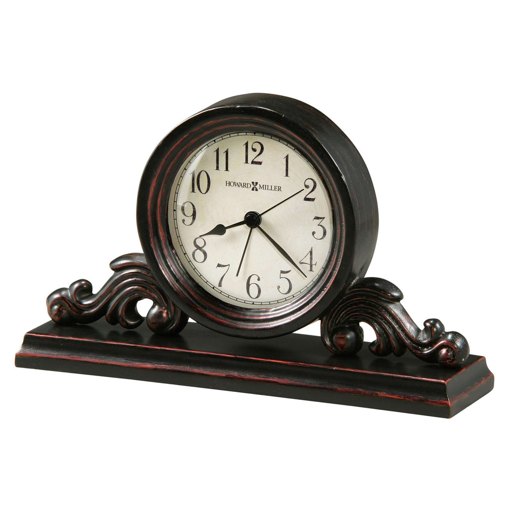 Antique-style mantel clock with a circular face and decorative base