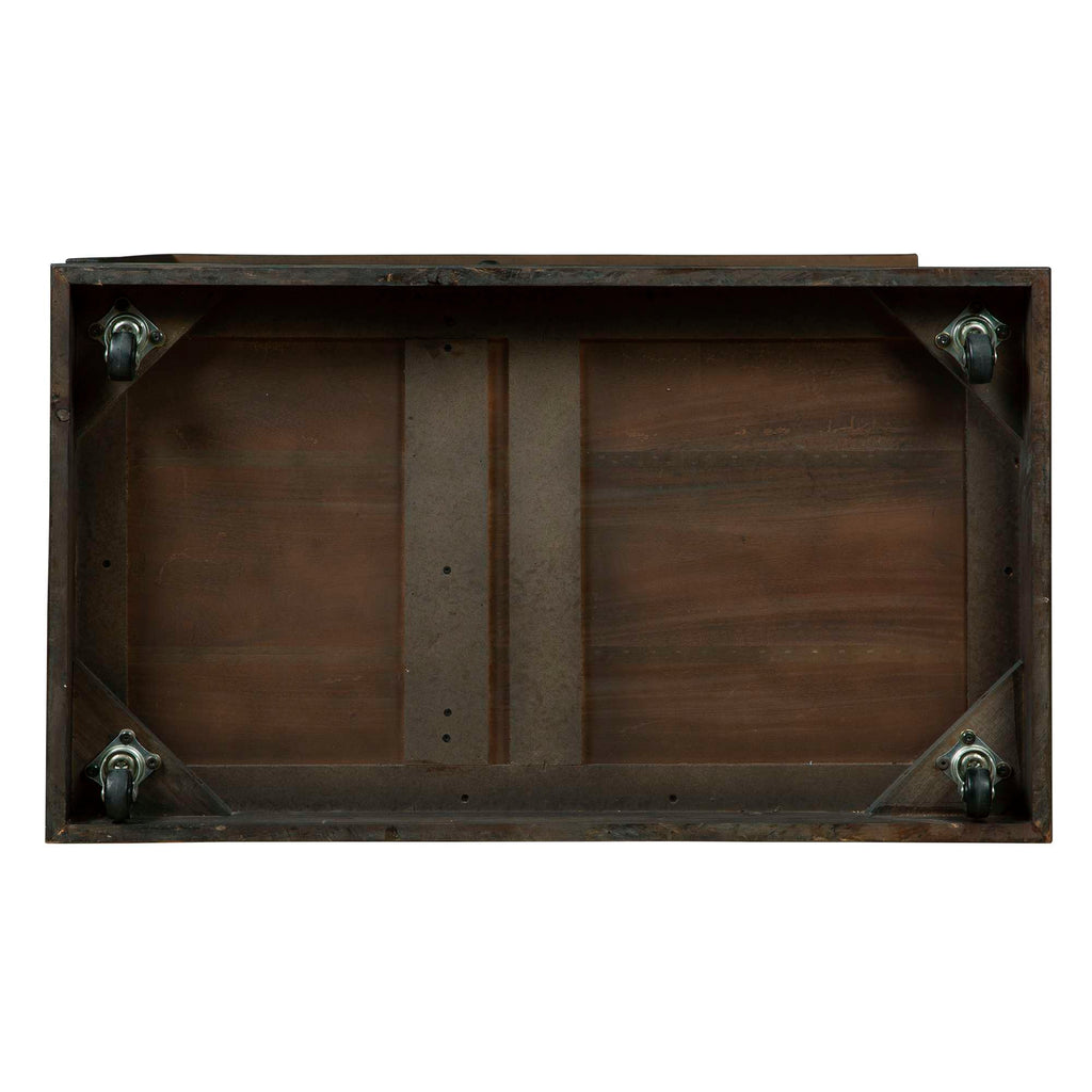 View of the underside of a wooden table with wheels.