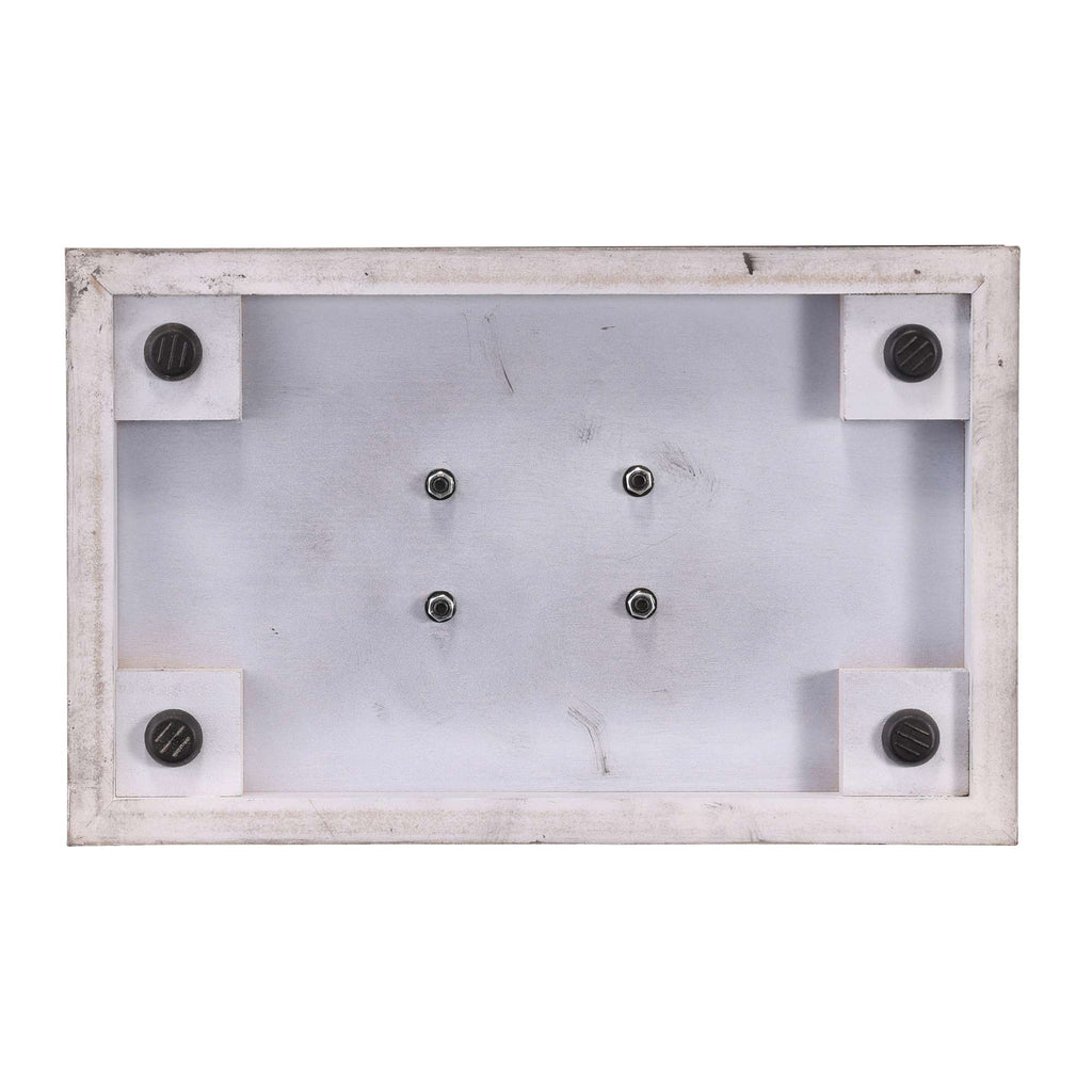 Close-up of a rectangular base with four corner pegs and several screws in a metal frame.