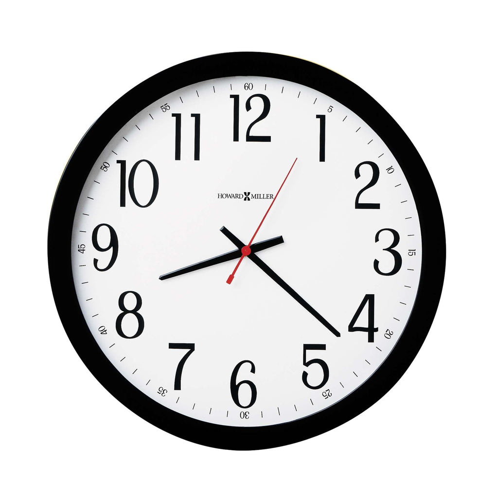 Round wall clock with black frame and white face showing the time