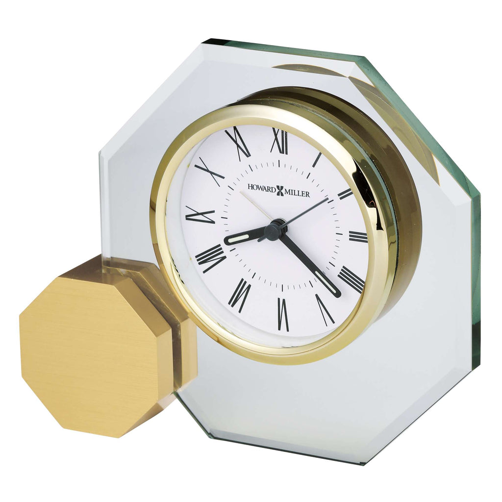 Elegant octagonal glass clock with gold accents and Roman numerals.