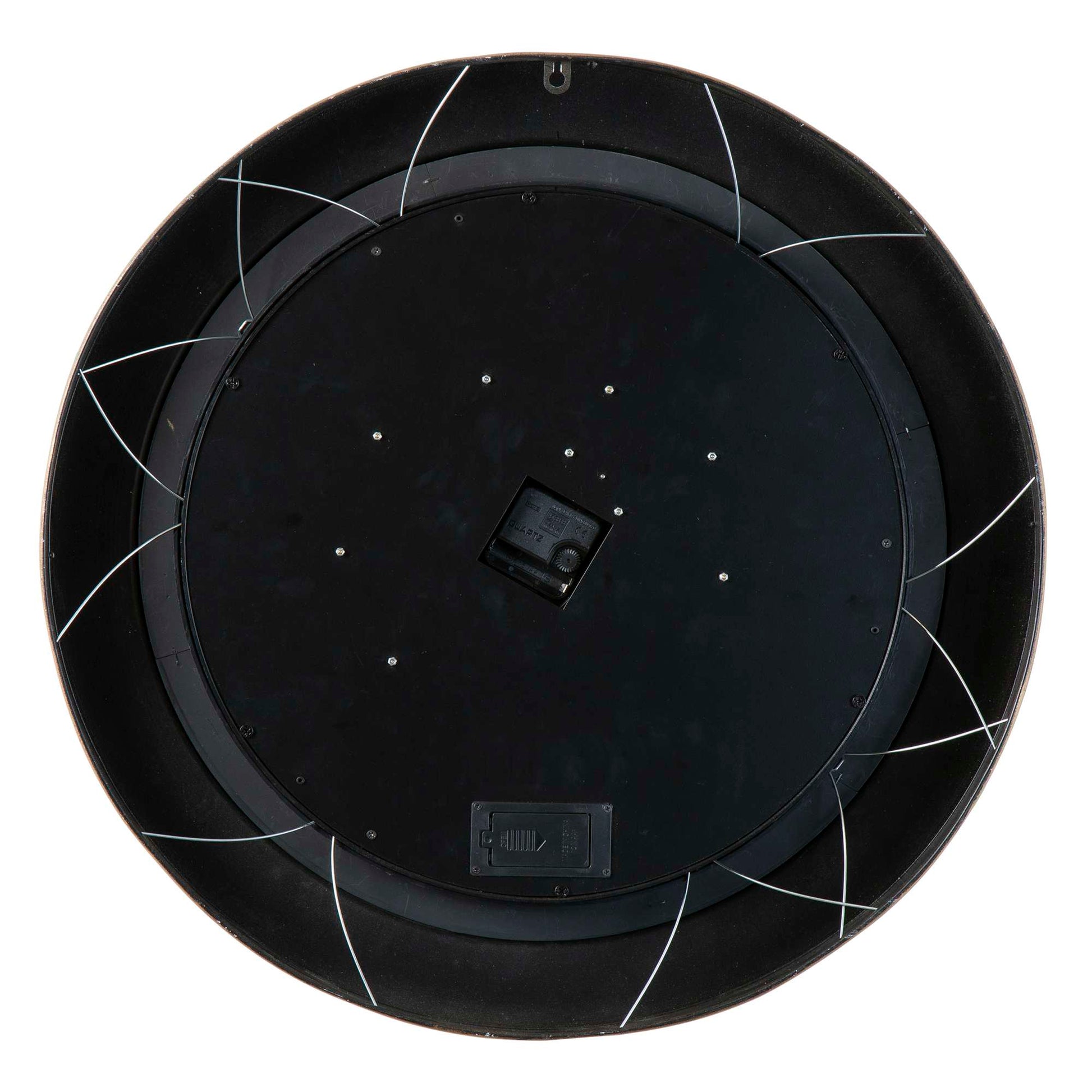Bottom view of a round black object with a central square component and white wiring.