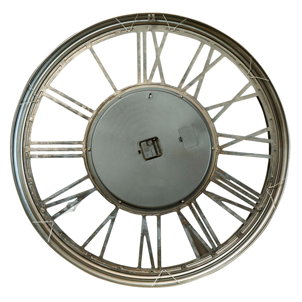 Top view of a round decorative wall clock without hands