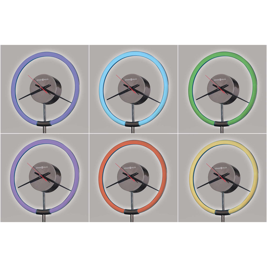 Six modern clocks with colored light rings in purple, blue, green, orange, red, and yellow.