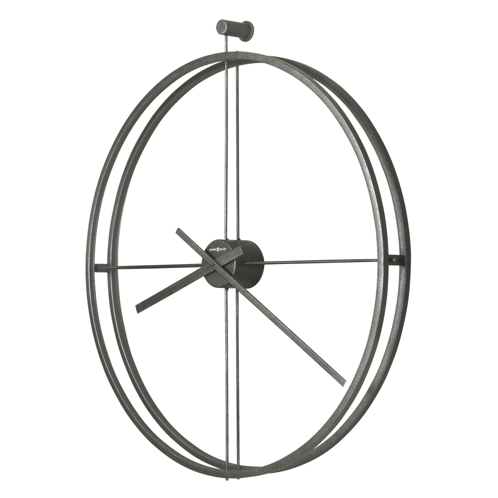 A decorative metal spinning propeller within a circular frame.