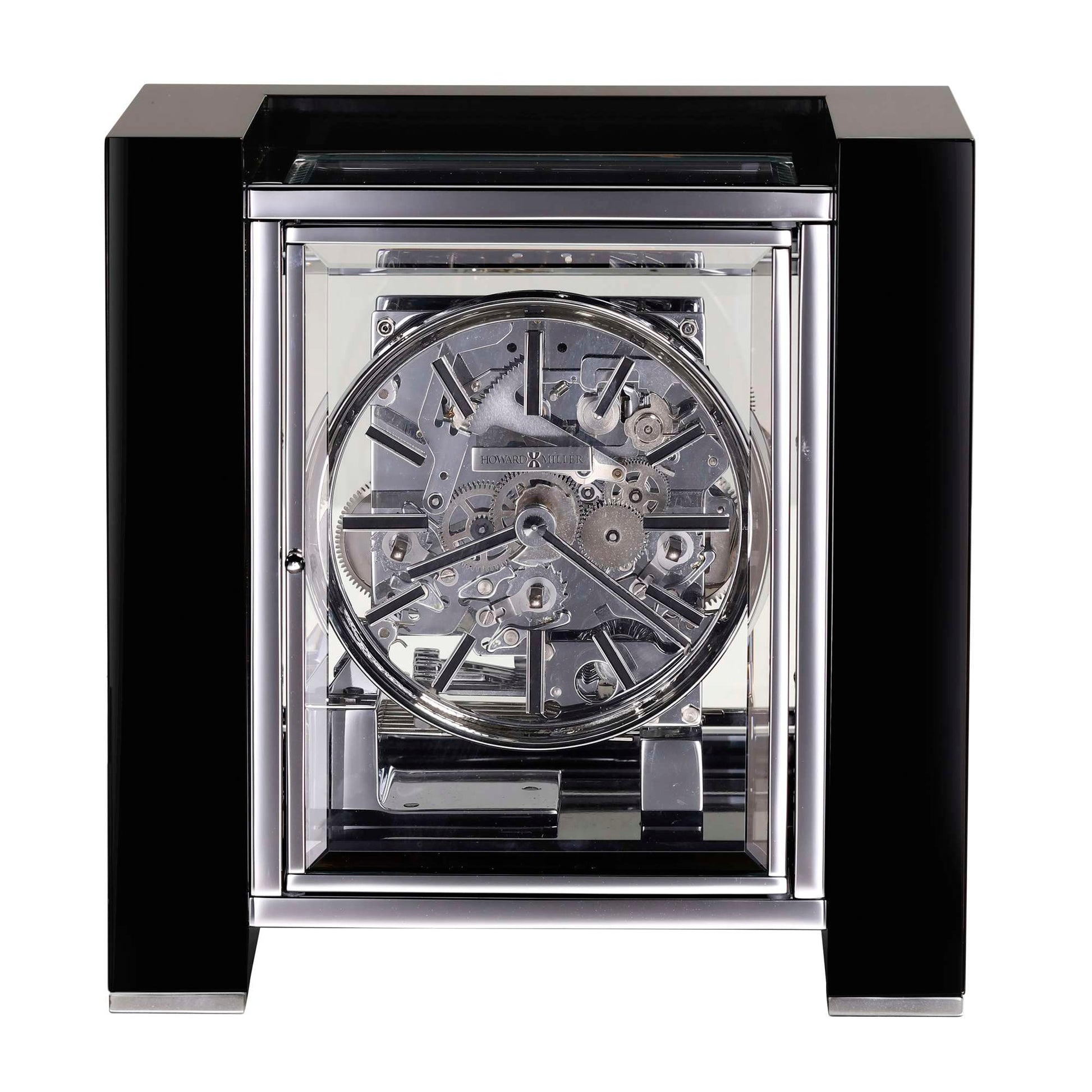 Close-up of a transparent mechanical clock with a black frame.
