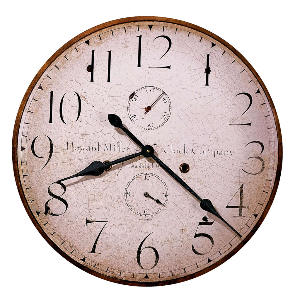 Vintage round wall clock with cracked face and large numerals.