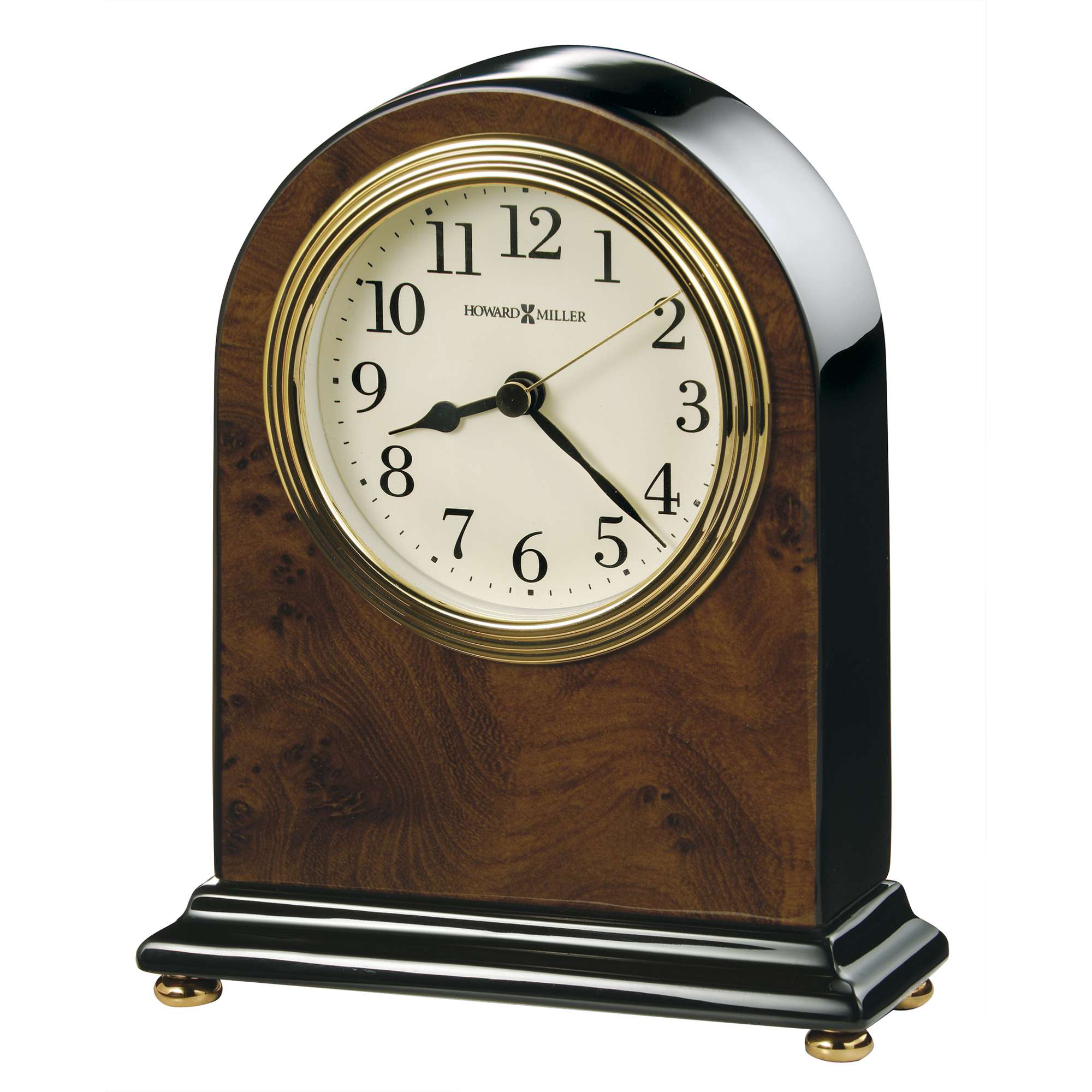 A decorative mantel clock with an arched top and wooden finish.