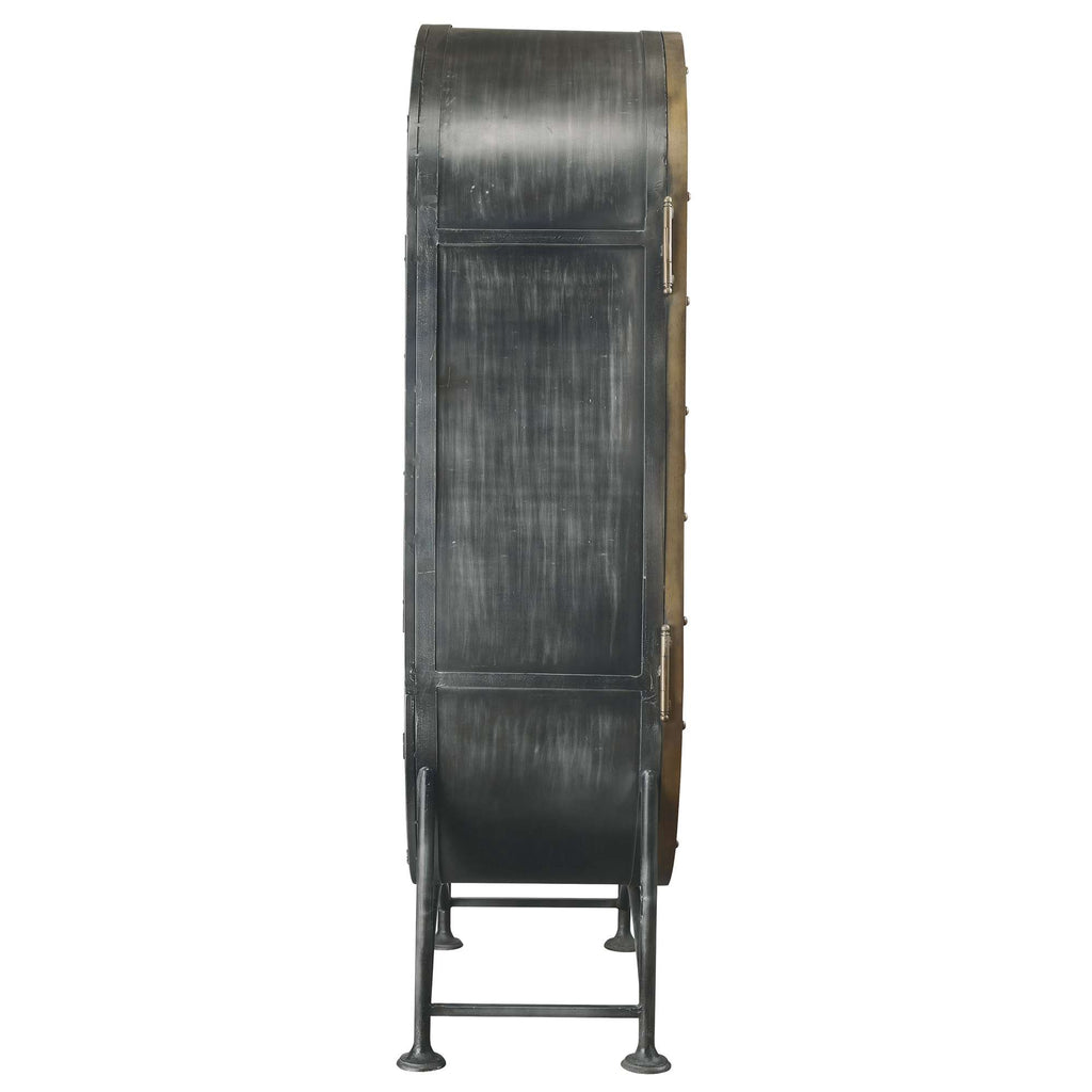 Side view of a vintage-style drum on a stand.